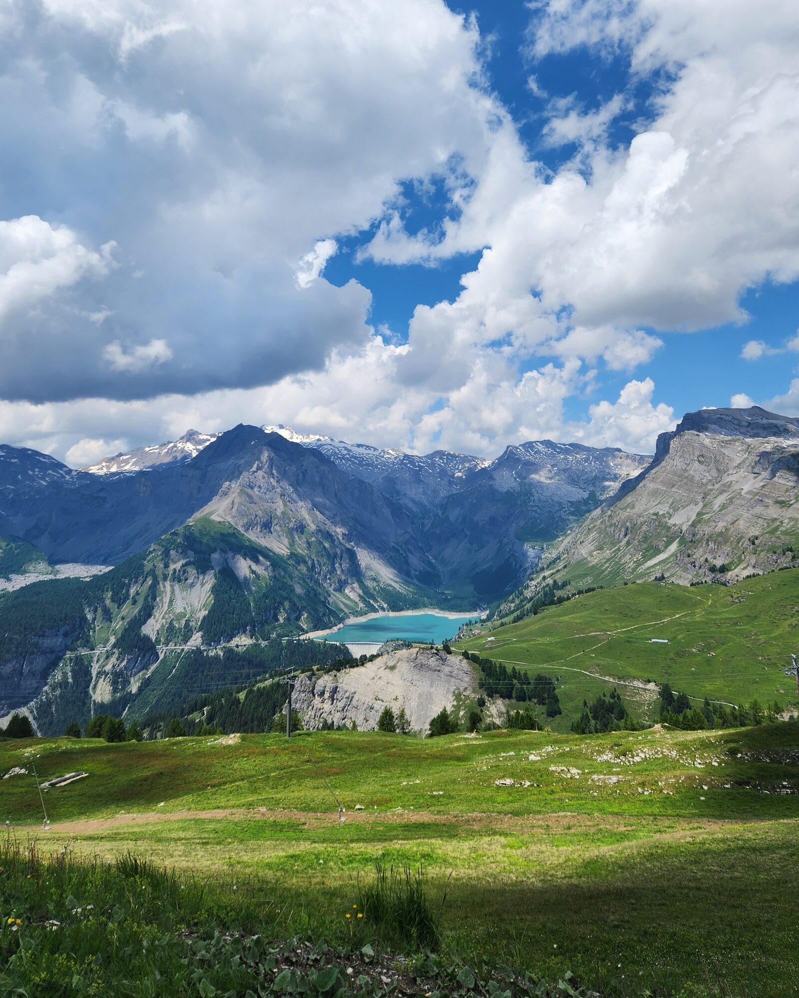 A quiet basecamp scene beside a mountain lake