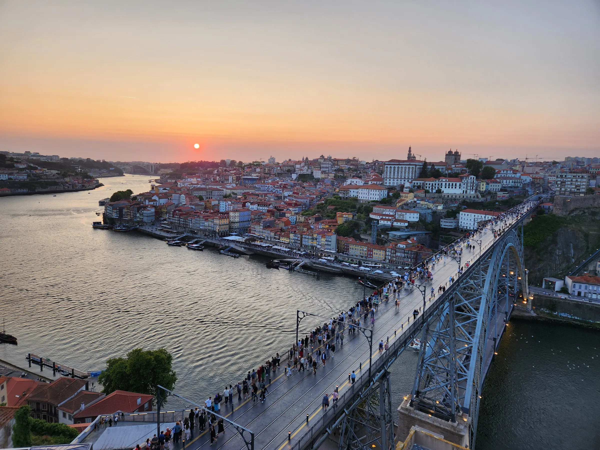 Porto at sunset from Gaia, with Ponte Luís I stretching across the Douro.